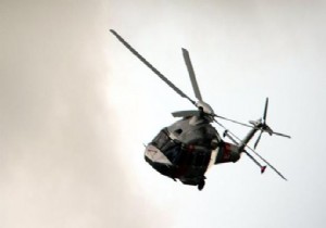 PİLOT HELİKOPTERDEN DÜŞTÜ